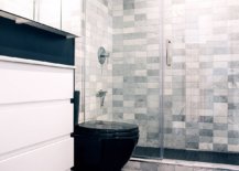 Adding-pattern-along-with-floor-using-black-tiles-in-the-bathroom-42174-217x155