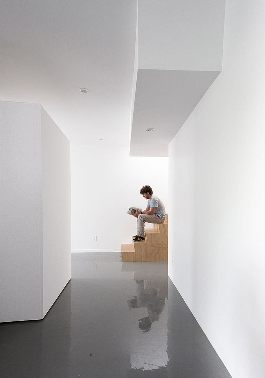 Beautiful epoxy floor of the home along with neutral backdrop gives the home a cool, contemporary appeal