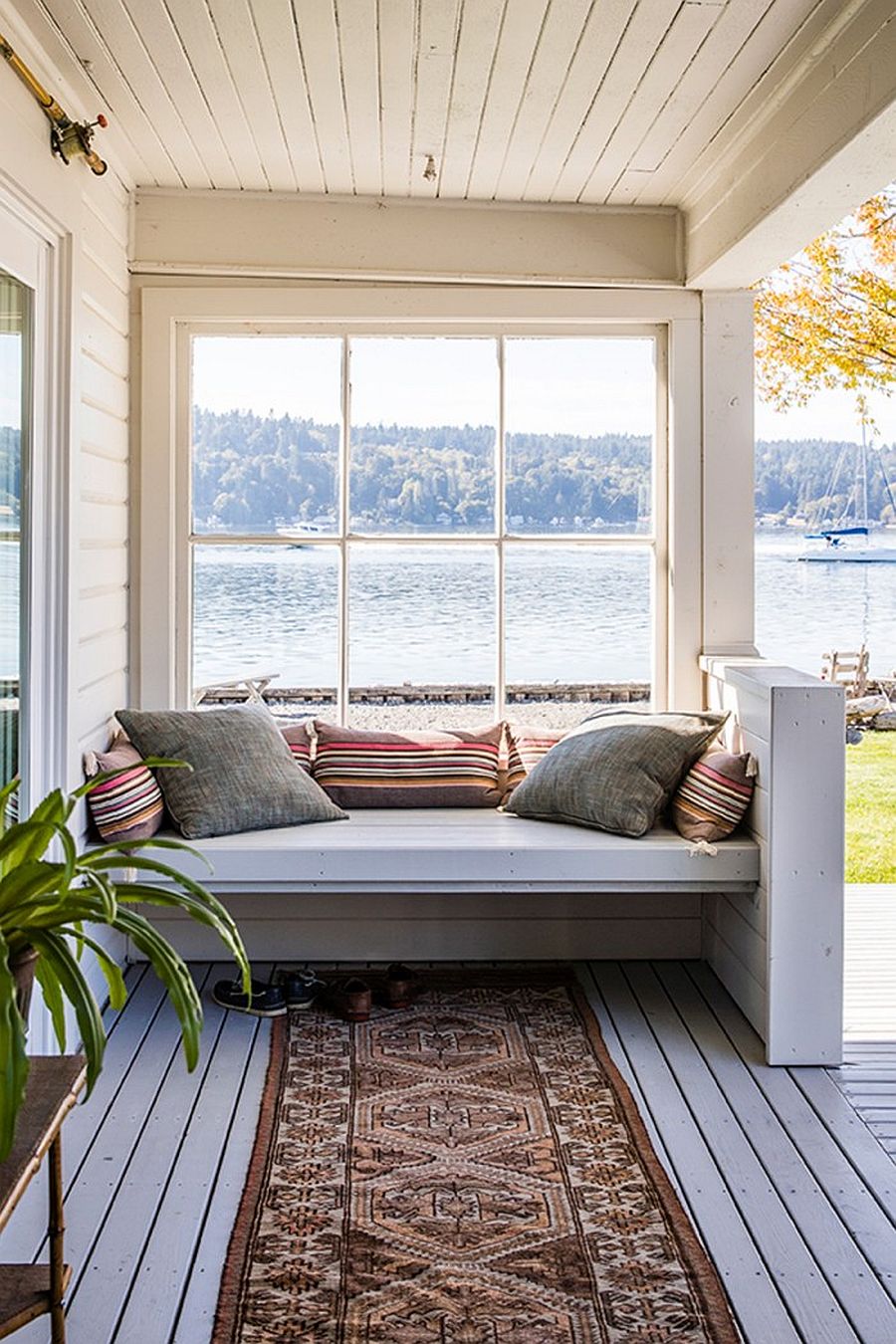 Bench on the wooden patio of the island home with fabulous veiws just beyond