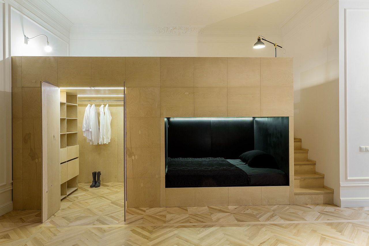 Bespoke wooden unit inside the apartment has two sleeping areas and a walk-in closet