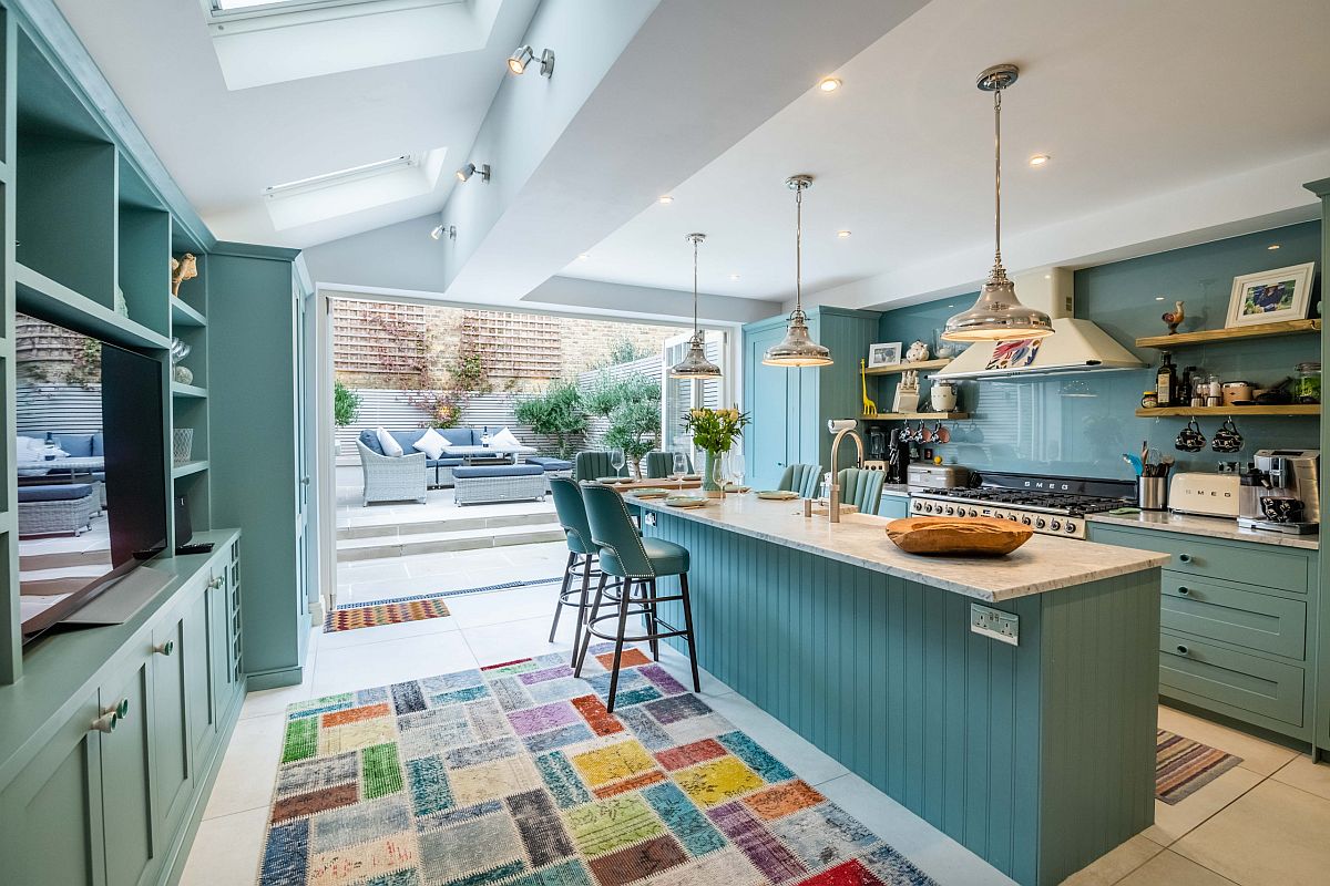 Blue links the kitchen with the rear yard and creates a sense of continuity