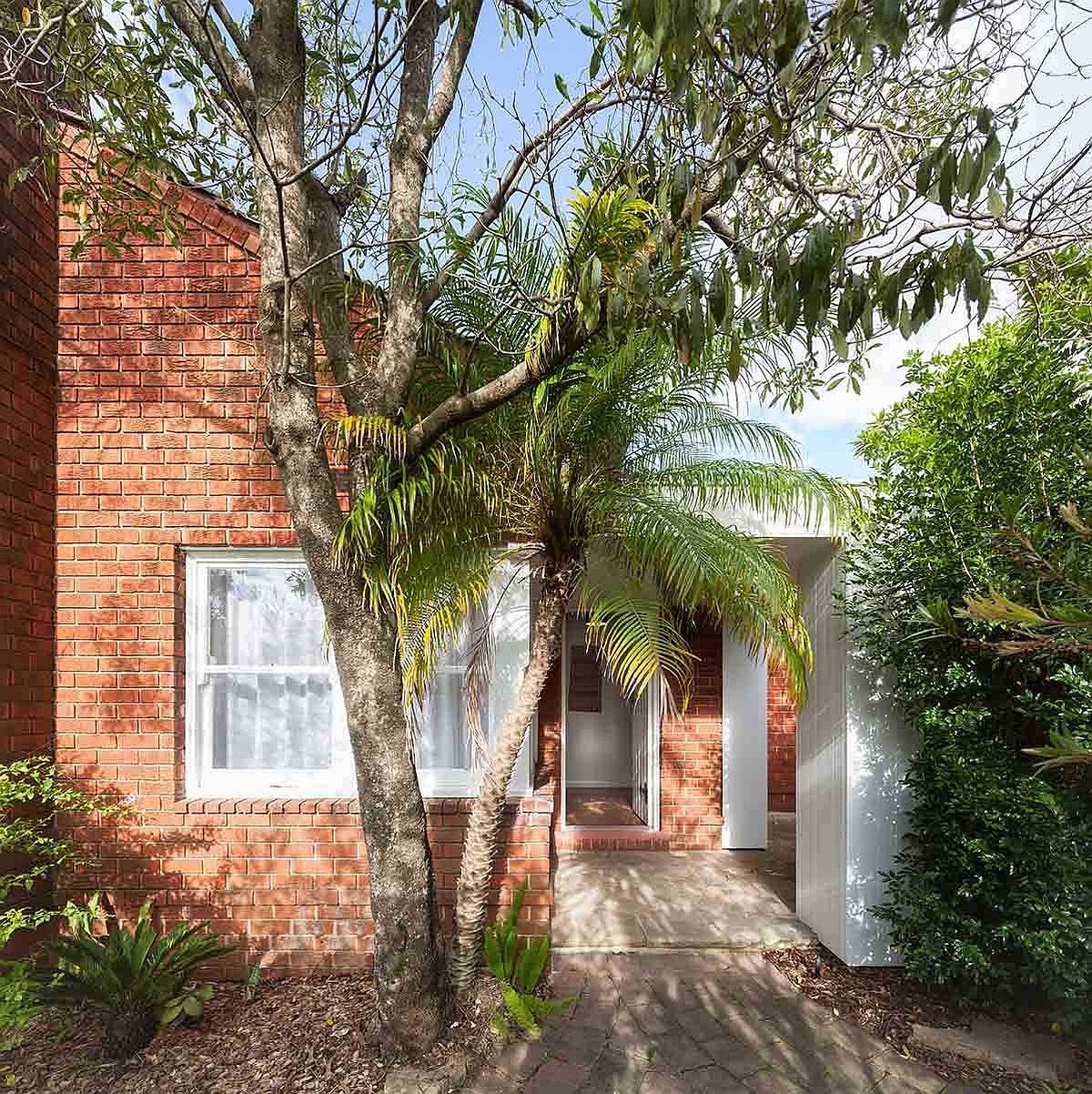 Classic street facade of the cottage home is left largey undisturbed