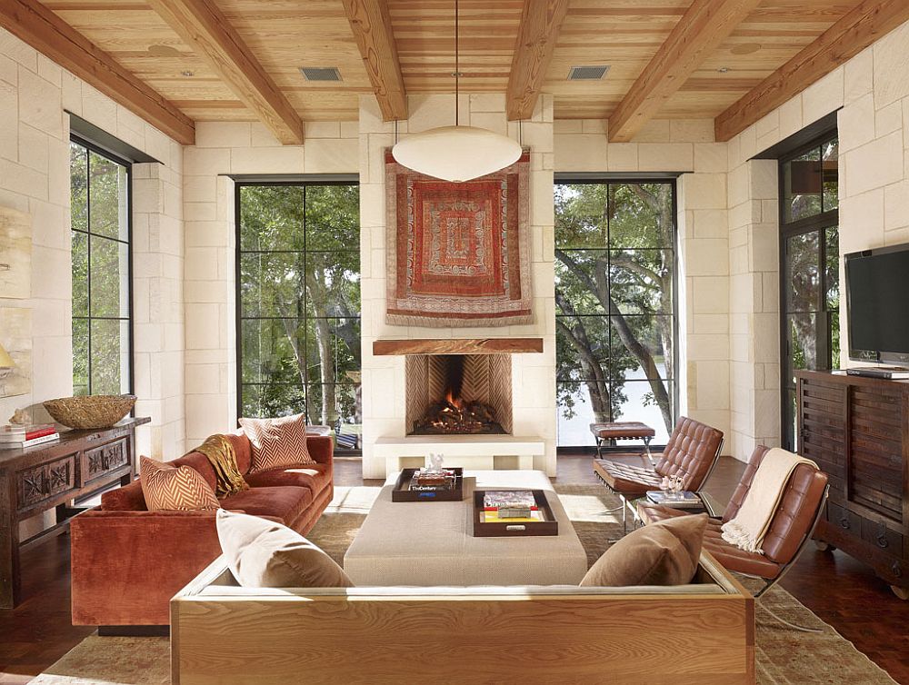 Contemporary living room of Texas home with gorgeous fireplace and captivating views of Lake Austin