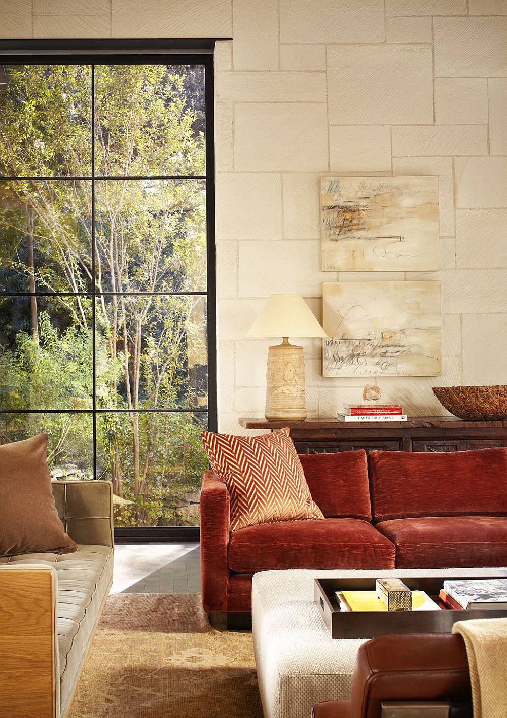 Cozy backdrop in cream combined with bright pops of color in the living room