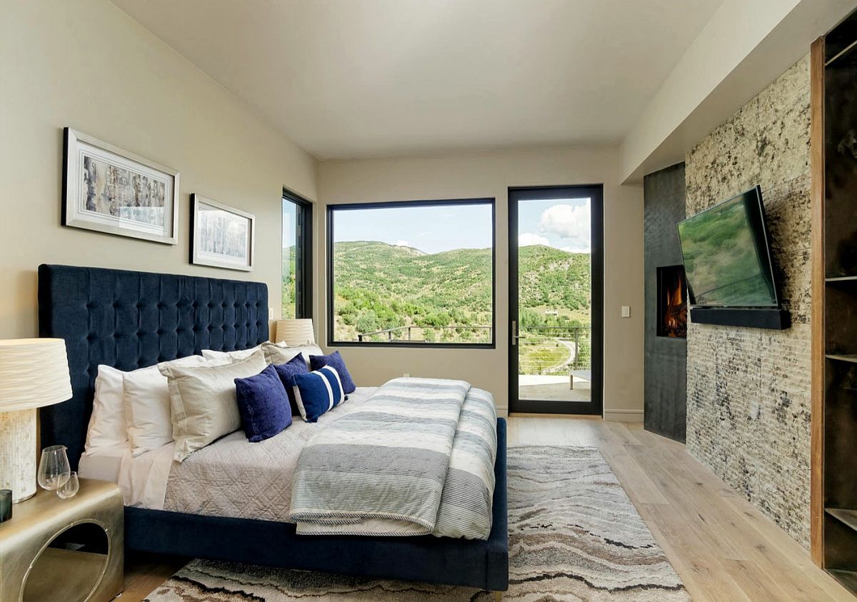 Cozy master bedroom with light beige walls and a modern rustic style that give it a unique appeal