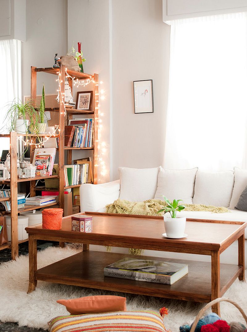 Decorate that eclectic living room with string lights for a merrier look!