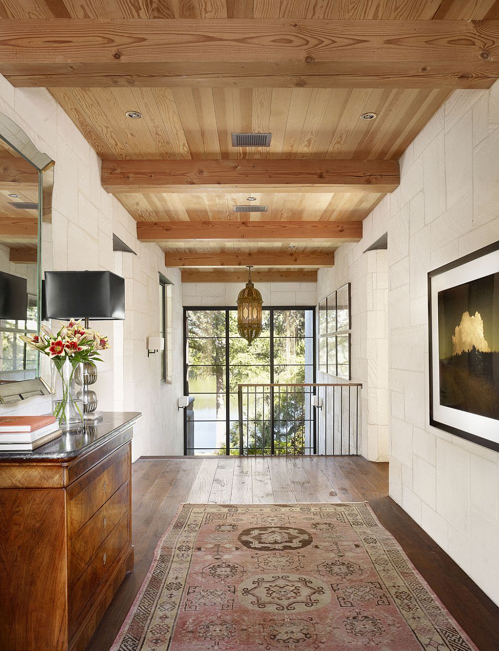 Decorating the staircase landing with art work and a carpet that steals the show