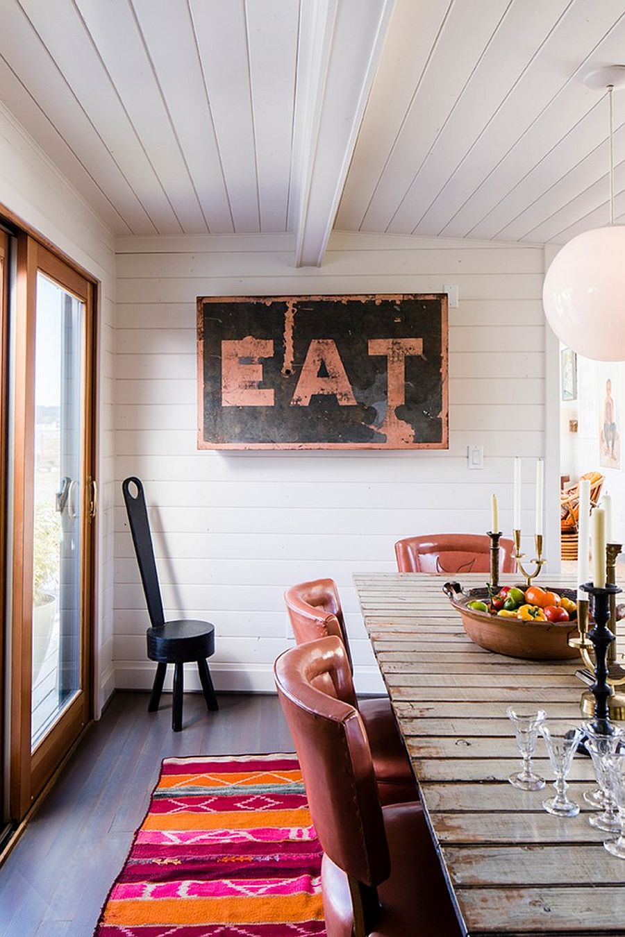 Dining area of the modern coastal island home with a revamped interior