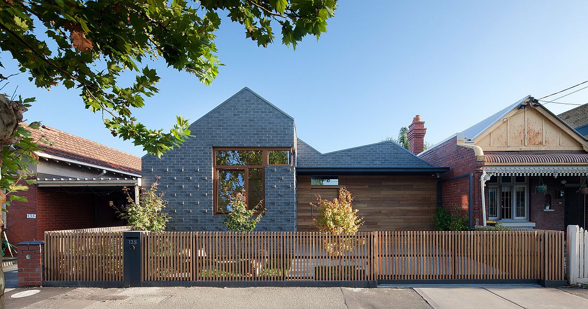 Exterior of the house in wood and gray has a modern classic appeal