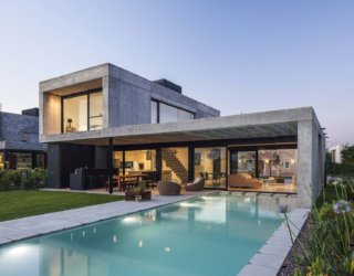 Contemporary Home of Young Couple in Buenos Aires Clad in Concrete and Glass