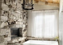Gorgeous-rustic-bathroom-with-a-stone-wall-fireplace-and-a-lovely-tub-in-white-39909-217x155