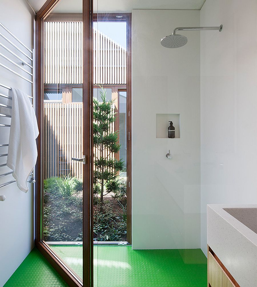 Green non-slip floor make the bathroom a much safer space