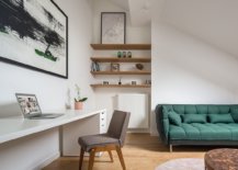 Home-workspace-and-living-area-are-rolled-into-one-on-the-upper-level-of-the-small-apartment-31992-217x155