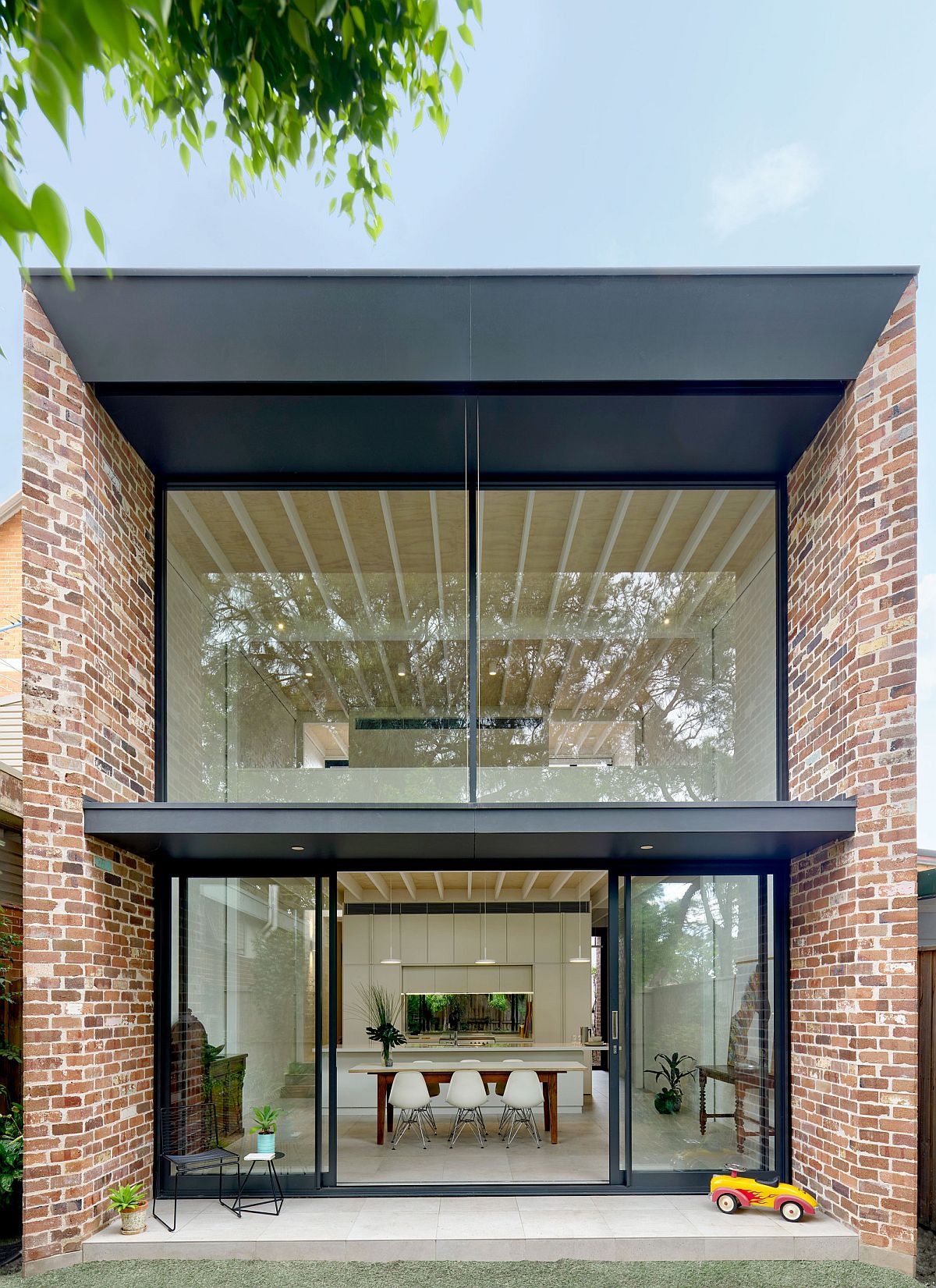 Kitchen and dining area on the lower level with an ensuite and studio above make up the rear extension