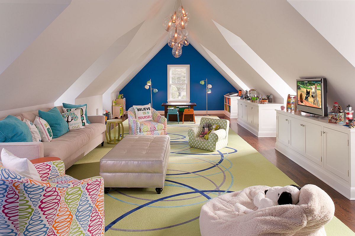 Large attic playroom in white with comfortable seating, ample space and a blue accent wall