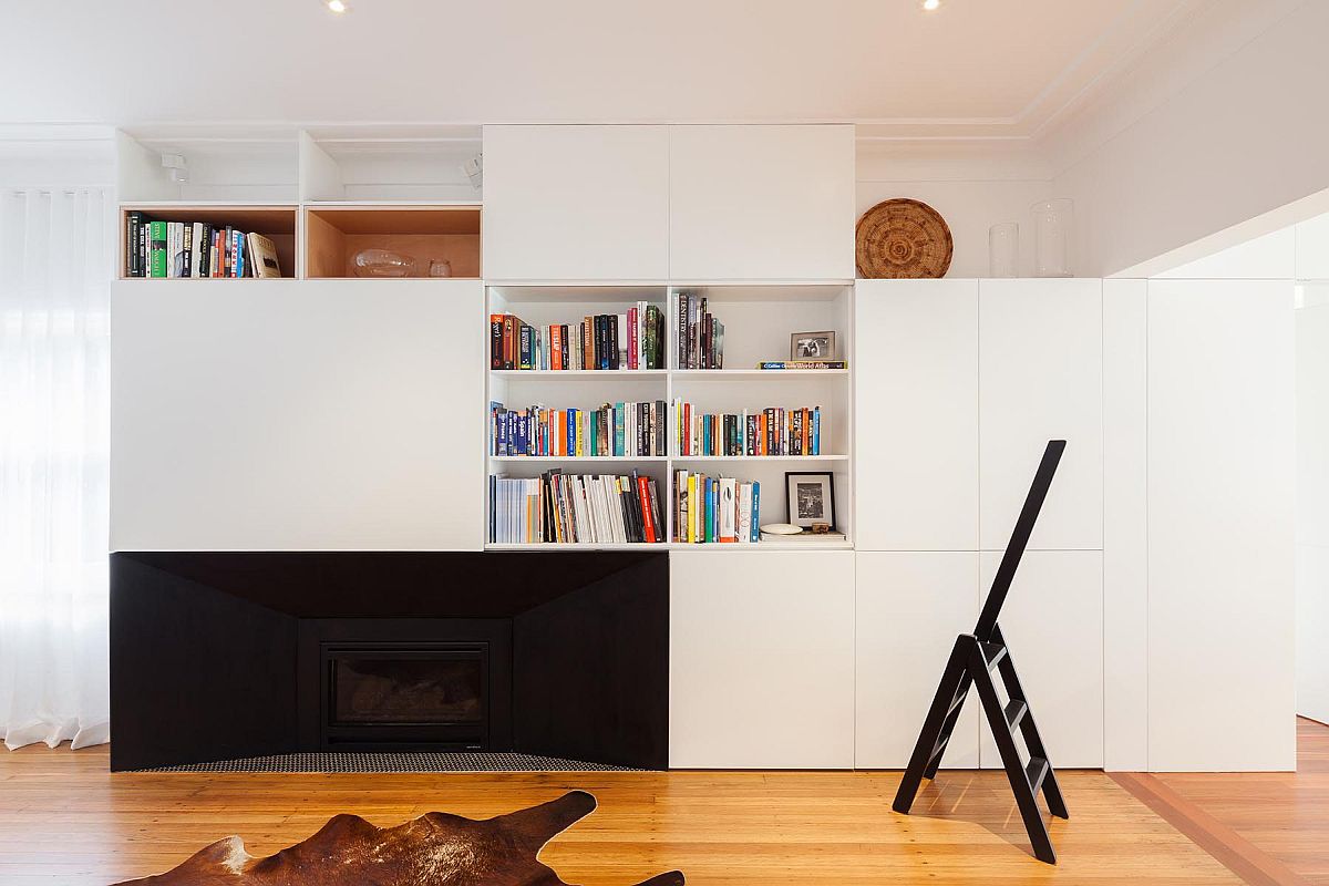 Living-area-of-the-home-with-white-walls-wooden-floor-and-accent-features-in-black-49797