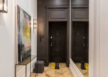 Mirror-at-the-entry-hallway-gives-the-interior-a-more-spacious-and-stylish-look-51055-217x155
