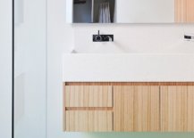 Modern-bathroom-in-white-with-wooden-vanity-and-a-non-slip-floor-41634-217x155