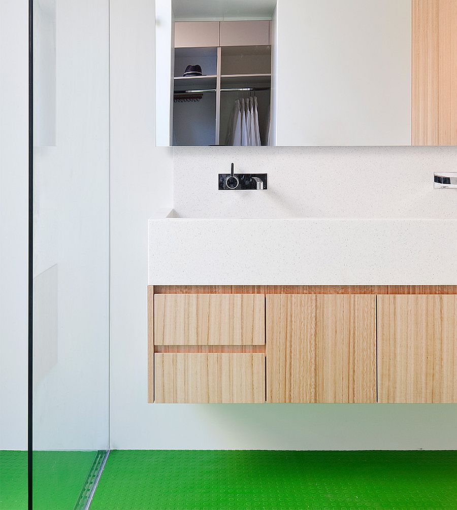 Modern bathroom in white with wooden vanity and a non-slip floor