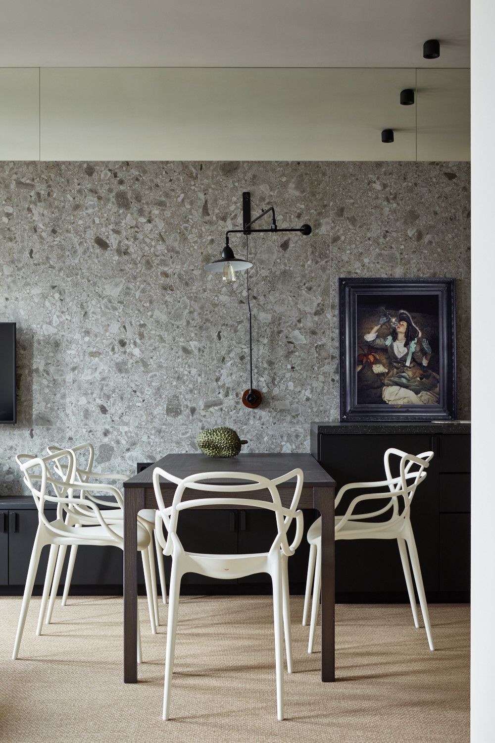 Modern minimal dining room with sculptural chairs in white