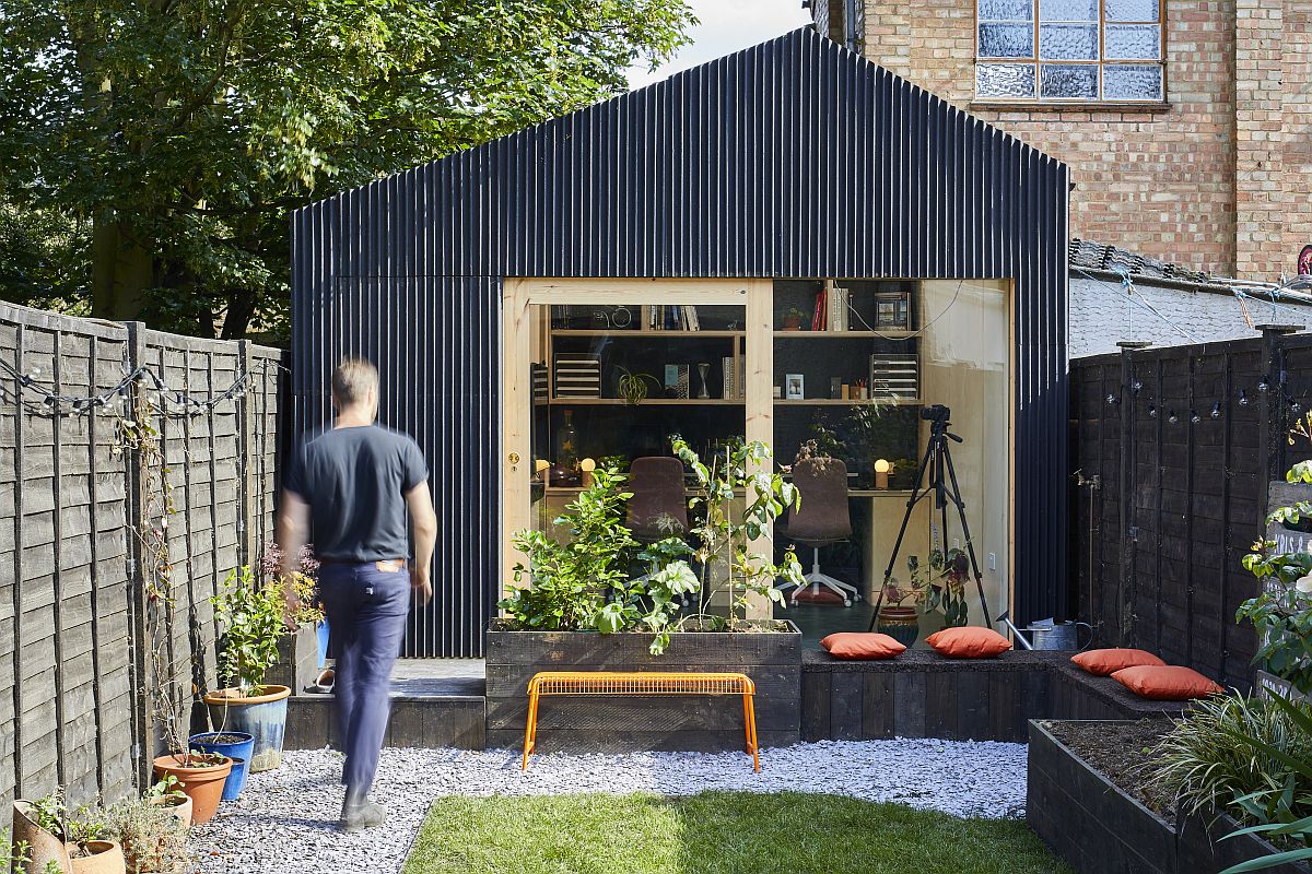 Outdoor sitting area and garden that add to the appeal of the backyard Light Shed in London