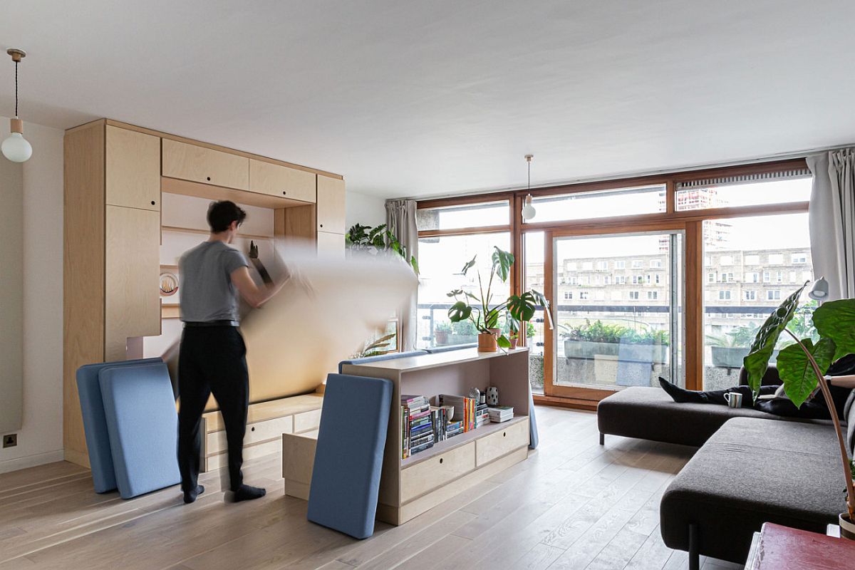 Removing the table and the cushions to make space for the fold-out bed