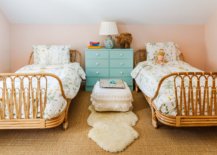 Shared-girls-bedroom-with-twin-rattan-beds-and-smart-furniture-77809-217x155