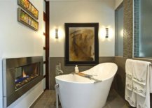 Soaking-tub-next-to-the-fireplace-inside-this-modern-classic-bathroom-is-the-perfect-place-to-relax-after-a-long-day-93351-217x155
