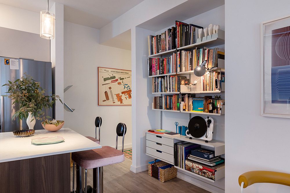 Space-savvy shelf in the small hallway that leads to the bedrooms from the kitchen