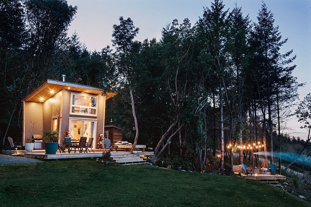 Wonderful forest area and the deck in the distance bring timeless charm to the beautiful island cabin