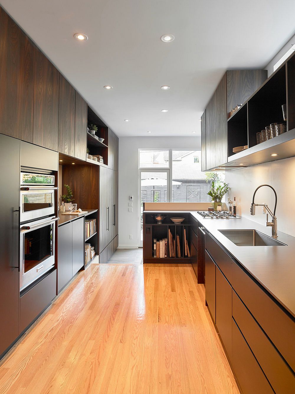 Wood and white kitchen of the Toronto home with a modern traditional style