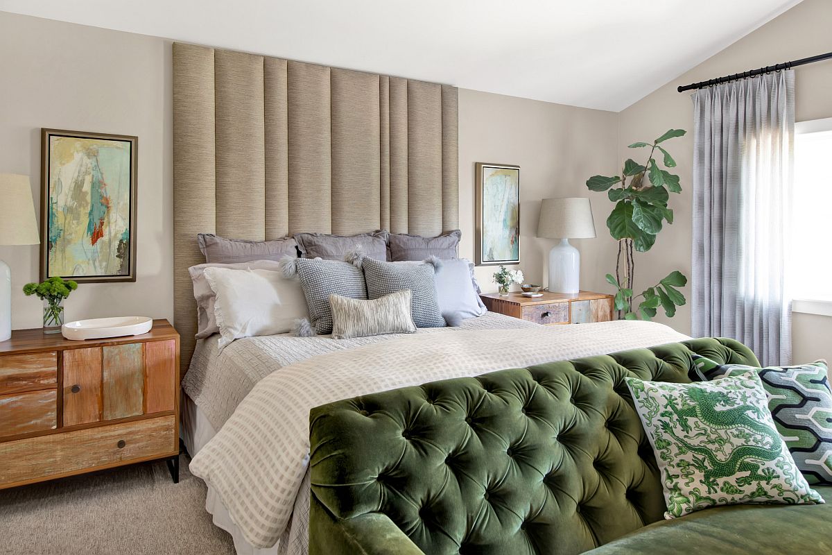 A splash of green, white backdrop and natural light give this bedroom a relaxing appeal