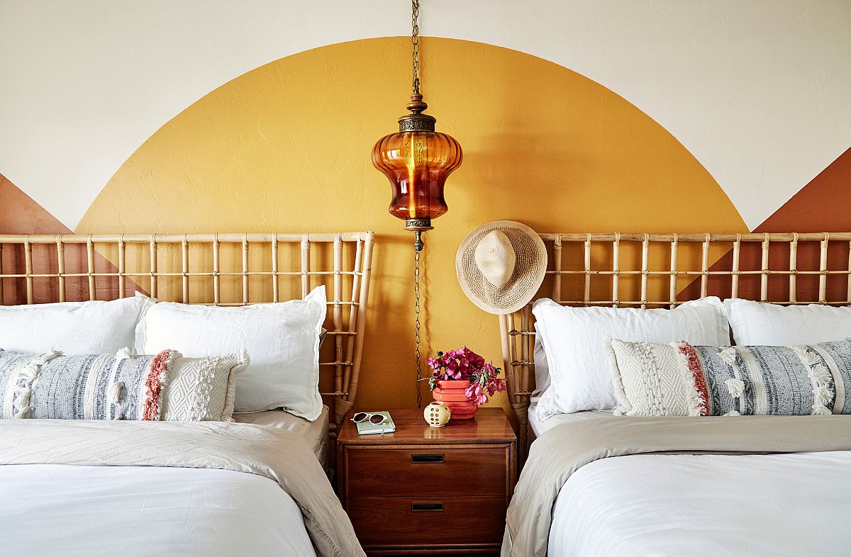 Beautiful guest bedroom inspired by 70’s Rock n’ Roll culture utilizes yellow in a clever and classy fashion