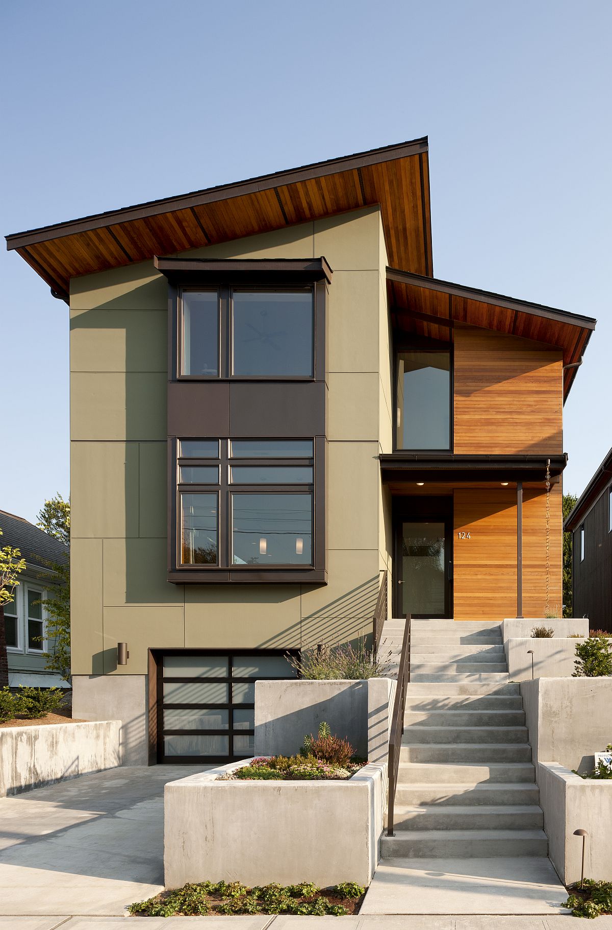Cedar and Fir add wamrth to the modern exterior of this Seattle family house