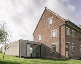 Beautiful Brick House in The Fields Gets a Half-Sunk Modern Extension
