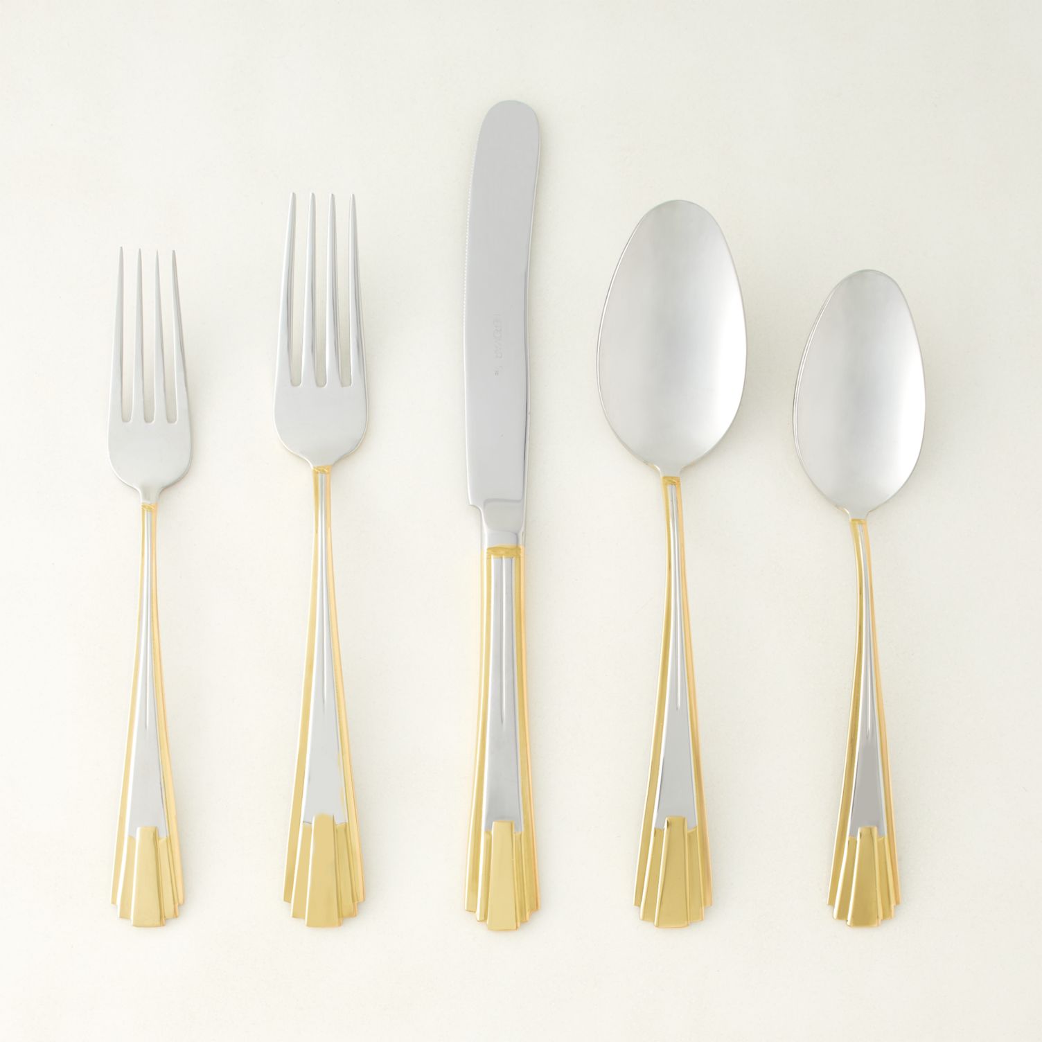 Deco-style flatware with gold detailing