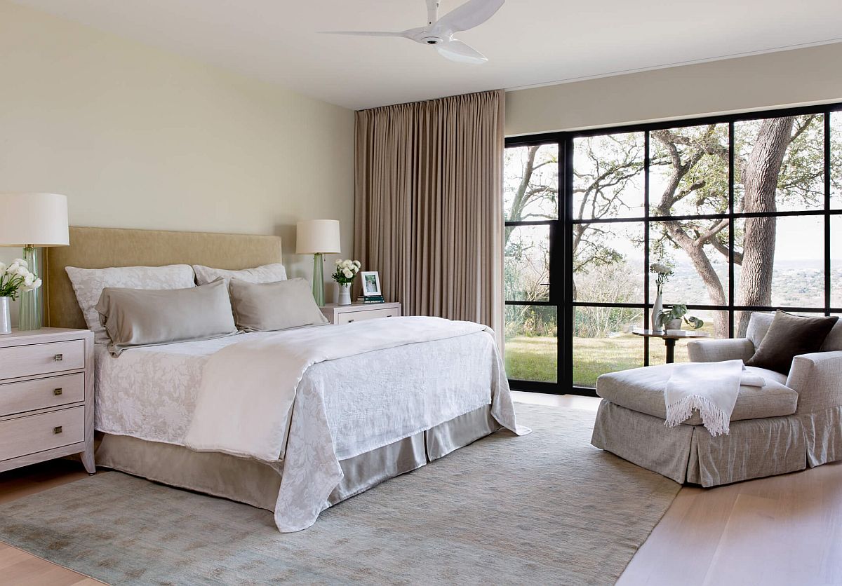 Decorating the bedroom with neutrals even as the oak tree outside adds contrast and color