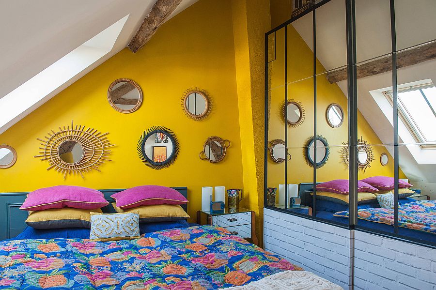 Delightful-small-Mediterranean-bedroom-in-the-attic-with-an-accent-yellow-wall-and-blue-bedding-13602