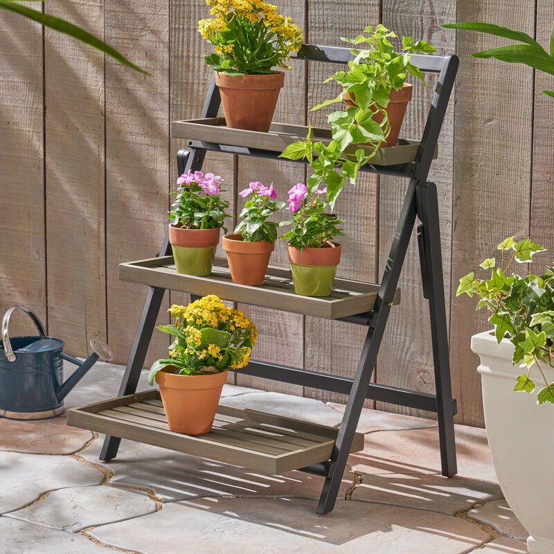 Folding plant stand with wooden shelves