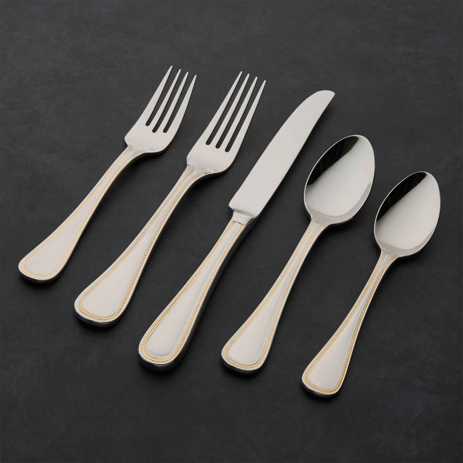 Grand Hotel flatware with gold-toned beaded border