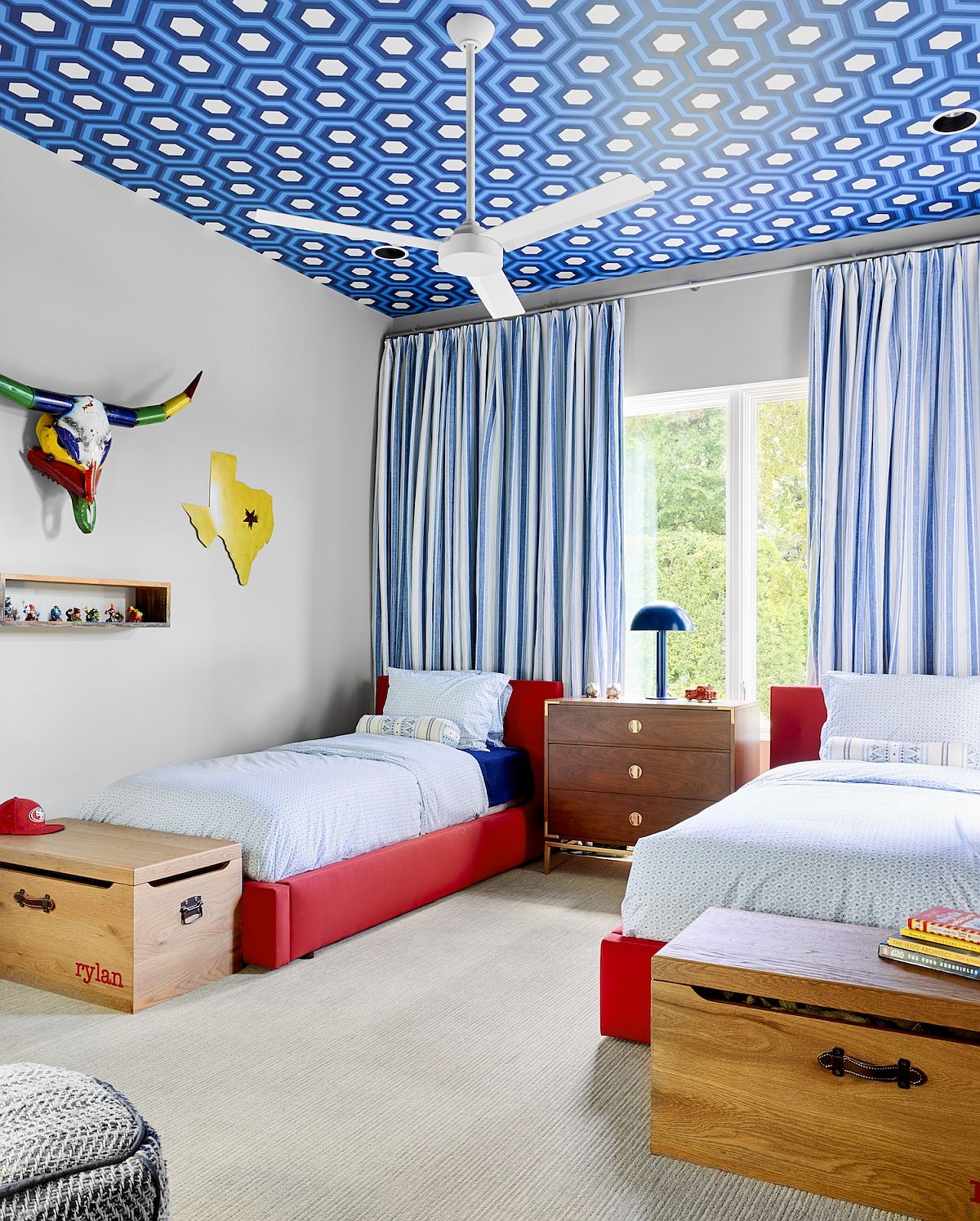 Hicks wallpaper for the ceiling brings brightness to the fabulous contemporary kids' bedroom with red bedframe