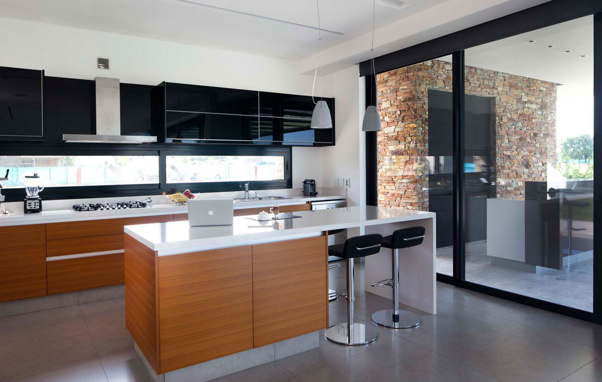 Modern kitchen of the Argentine home connected with the outdoors