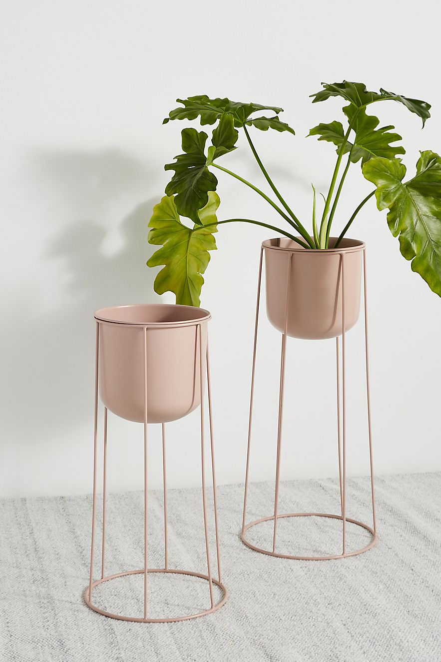 Pink metal plant stand for indoors or outdoors