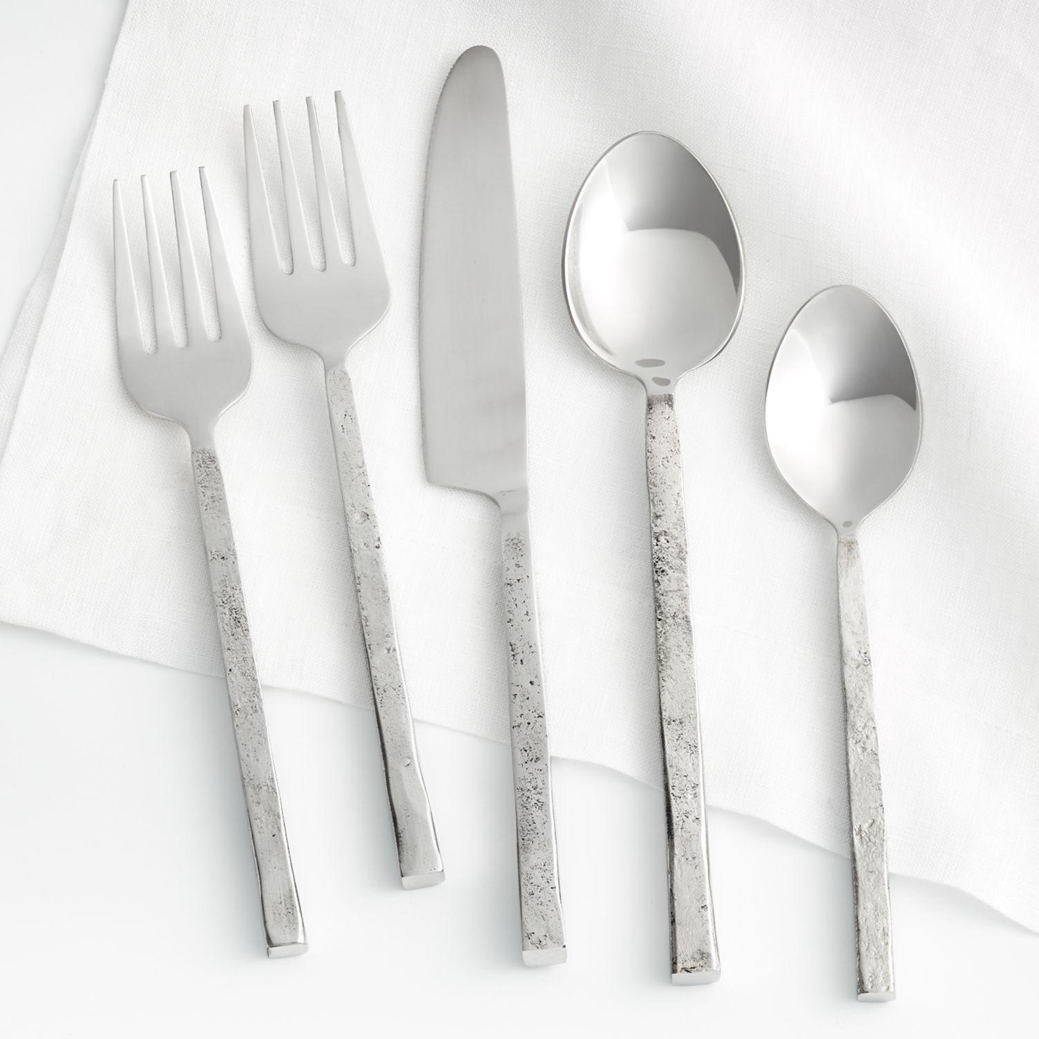 Rustic flatware with hand-forged handles