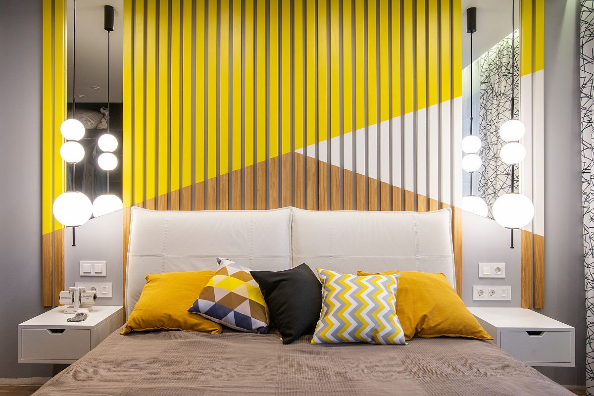 Snazzy blend of color and pattern inside the trendy Moscow apartment bedroom with plenty of yellow