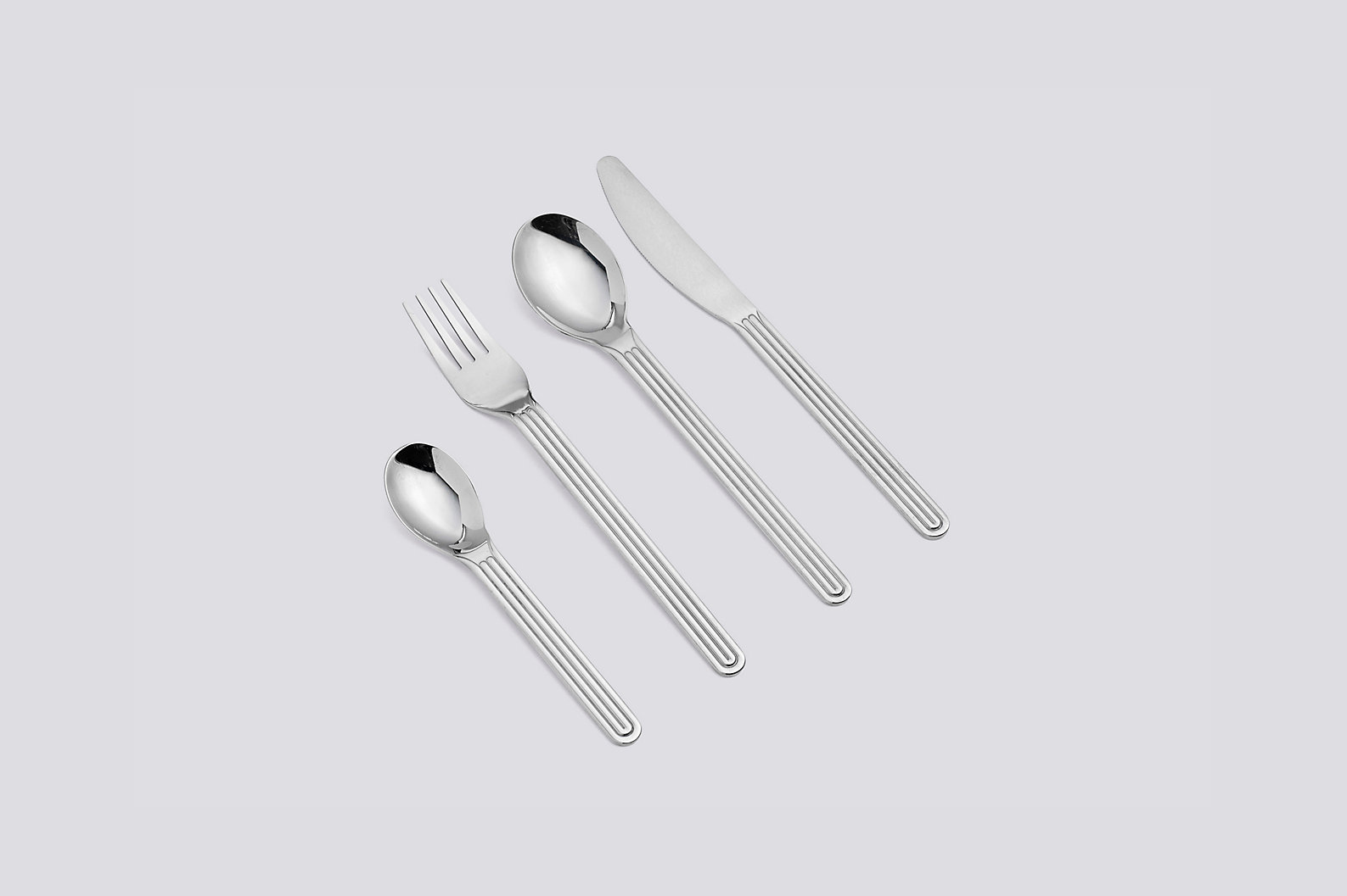 Stainless steel flatware with fluted handles by Hay