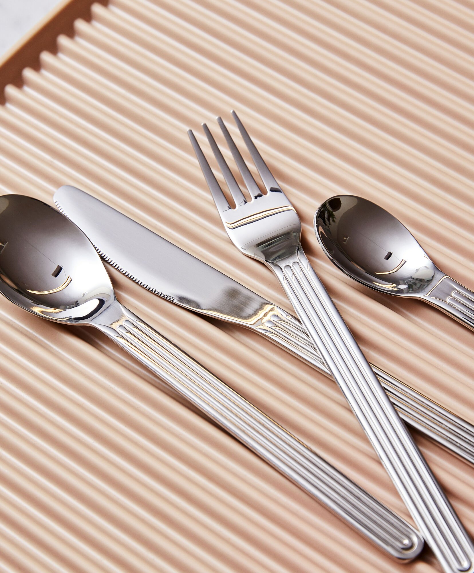 Stainless steel grooved flatware from Hay