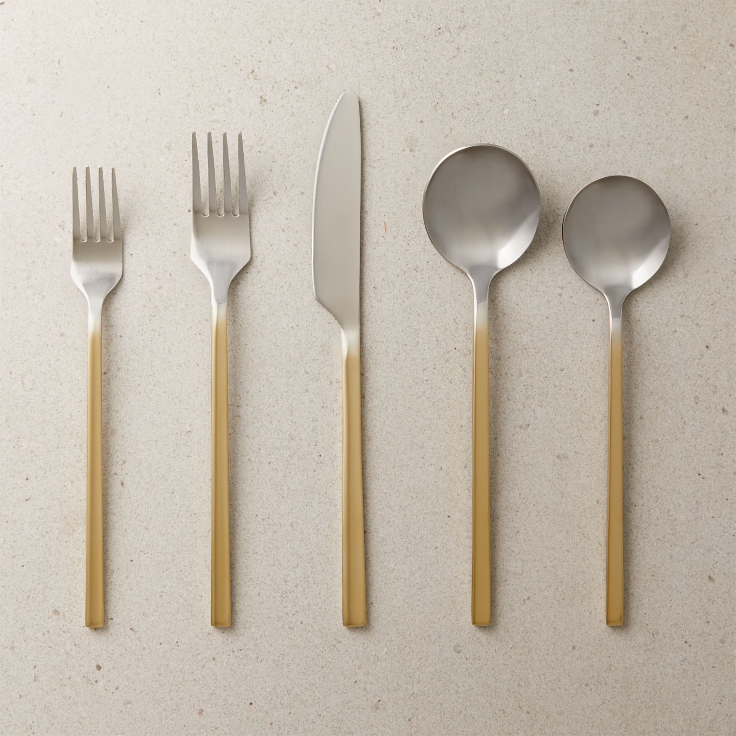 Two-toned flatware with a fade effect