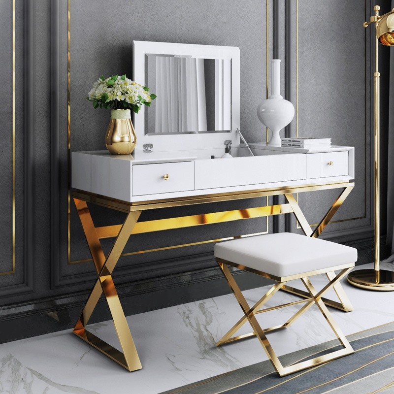 White vanity with gold-toned detailing