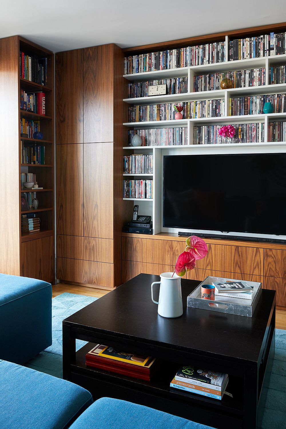 Awesome book and DVD collection finds perfect space in the large living room booshelf